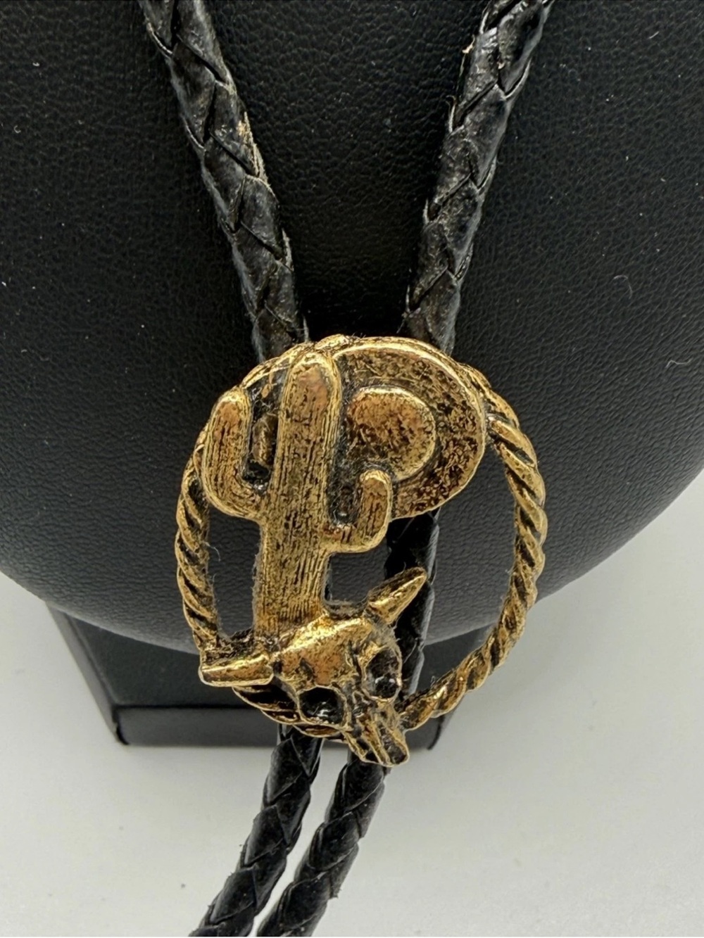 Black Leather Bolo Tie with Gold Cactus & Bull Skull Slide